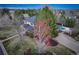 Aerial view of the home featuring a private backyard oasis and a sparkling pool at 6724 S Yates Ct, Littleton, CO 80128