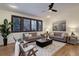 Stylish living room featuring hardwood floors, neutral decor, and comfortable seating at 6724 S Yates Ct, Littleton, CO 80128