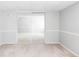 Bright, airy bedroom with a large mirrored closet and soft, neutral tones at 7680 Elmwood St, Littleton, CO 80125