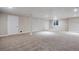 A spacious basement with neutral carpeting, recessed lighting and plenty of room at 25669 E Fair Dr, Aurora, CO 80016