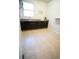 Functional laundry room with ample counter space, sink, and cabinets at 25669 E Fair Dr, Aurora, CO 80016