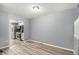 Open dining room leading to the kitchen with stainless steel appliances at 4621 S Fraser Cir # B, Aurora, CO 80015