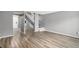 Bright living room with hardwood floors and access to other parts of the home at 4621 S Fraser Cir # B, Aurora, CO 80015