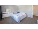 Bedroom with double bed, dresser and large mirror at 14734 E Evans Pl, Aurora, CO 80014