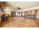This fully finished basement boasts a custom bar, desk area, and plenty of living space at 1552 Colt Cir, Castle Rock, CO 80109