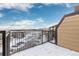 Private balcony with metal railing offers stunning views of the neighborhood at 15475 Andrews Dr # 412, Denver, CO 80239