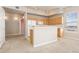 Bright and spacious kitchen with modern lighting and ample counter space at 15475 Andrews Dr # 412, Denver, CO 80239