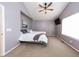 Spacious main bedroom with high ceilings, ceiling fan, neutral color palette and ensuite bath at 257 Cherry St, Castle Rock, CO 80104