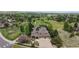 Stunning two-story home with a large driveway and solar panels nestled in a green, Gathering-friendly community at 5448 El Diente St, Golden, CO 80403