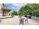 Outdoor patio features a fire pit, grilling area, comfortable seating, and lush landscaping for ultimate relaxation and entertainment at 5448 El Diente St, Golden, CO 80403