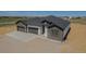 Charming single-Gathering home featuring a three-car garage and stone and white siding at 56159 E Tomahawk Ave, Strasburg, CO 80136