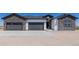Charming new home features stone accents, three-car garage, and sleek modern design at 56159 E Tomahawk Ave, Strasburg, CO 80136