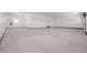 Spacious garage with ample room for vehicles and storage, bright interior at 56159 E Tomahawk Ave, Strasburg, CO 80136