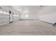 Spacious garage with ample room for vehicles and storage, bright interior at 56159 E Tomahawk Ave, Strasburg, CO 80136