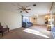 Inviting living space featuring carpet and a comfortable sofa at 971 Elm Pl, Thornton, CO 80229