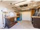 Practical workshop space with ample storage and work surfaces at 971 Elm Pl, Thornton, CO 80229