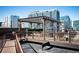 Rooftop deck provides a quiet spot to relax with comfortable seating and fantastic city views at 1801 Wynkoop St # 518, Denver, CO 80202