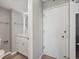 Entry to the bathroom featuring a new vanity with ample storage at 850 20Th St # 503, Boulder, CO 80302