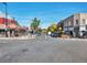 Charming street view highlights local businesses and outdoor dining under a bright blue sky at 850 20Th St # 503, Boulder, CO 80302