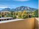 Balcony with views of rolling mountains and lush greenery at 850 20Th St # 503, Boulder, CO 80302