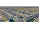 An aerial view showing the arrangement of homes and landscaping in a new residential community at 18813 E 99Th Ave, Commerce City, CO 80022