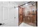 Modern shower stall with decorative tile and glass door at 271 Terra Vista St, Brighton, CO 80601