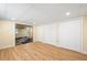 Spacious bedroom featuring laminated flooring, white trim and 3 closets at 271 Terra Vista St, Brighton, CO 80601