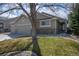 Beautiful home with well-maintained lawn and stone accents, showcasing inviting curb appeal at 271 Terra Vista St, Brighton, CO 80601