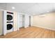 Laundry area featuring modern washer and dryer with storage closets at 271 Terra Vista St, Brighton, CO 80601