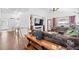 Bright living room with vaulted ceilings, hardwood floors, and neutral decor at 271 Terra Vista St, Brighton, CO 80601