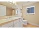 Bathroom featuring tiled countertops and shower-tub combo at 520 Jackson St, Denver, CO 80206