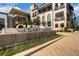 Beautiful exterior view of the property with the Cherry Creek monument sign on a manicured lawn at 520 Jackson St, Denver, CO 80206