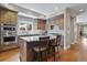 Gourmet kitchen with stainless steel appliances, marble countertops, and a central island at 520 Jackson St, Denver, CO 80206