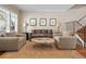 Cozy living room featuring comfortable seating, hardwood floors, and plenty of natural light at 520 Jackson St, Denver, CO 80206