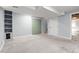 Spacious basement with carpet flooring, utility closet and convenient access to upper floors at 1359 S Beeler Ct, Denver, CO 80247