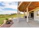 Enjoy the back patio with beautiful views of the neighborhood and a built in fire pit to keep you warm at 2504 Elkhorn Ranch St, Parker, CO 80138