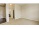 Cozy bedroom with neutral carpet, convenient closet and adjacent bathroom access at 2504 Elkhorn Ranch St, Parker, CO 80138