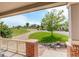 Picturesque front porch view with lush landscaping and charming neighborhood scenery at 2504 Elkhorn Ranch St, Parker, CO 80138