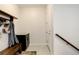 Welcoming mudroom with bench, cabinet, and convenient storage for coats and hats at 2504 Elkhorn Ranch St, Parker, CO 80138