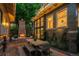 Cozy backyard patio featuring an outdoor fireplace and a dining area, perfect for entertaining at 1500 E 7Th Ave, Denver, CO 80218