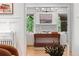 Sophisticated living room featuring fireplace, custom millwork, and stylish furnishings at 1500 E 7Th Ave, Denver, CO 80218