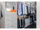 Walk-in closet with gray drawers and shelving offering ample storage space for clothes and accessories at 1500 E 7Th Ave, Denver, CO 80218