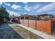 Spacious backyard with privacy fence, offering a secluded outdoor area at 2461 Yates St, Denver, CO 80212
