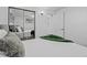 This bedroom features mirrored sliding door closets and a light and airy feel at 2461 Yates St, Denver, CO 80212