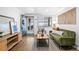 Comfortable living room with a modern design and plenty of natural light at 2461 Yates St, Denver, CO 80212