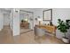 Home office featuring natural light, a modern desk, and ample storage at 2461 Yates St, Denver, CO 80212