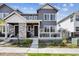 Charming two-story home with stone accents and a welcoming front porch and landscaped yard at 8863 Osceola St, Westminster, CO 80031