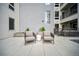 Modern patio area with stylish outdoor seating and minimalist decor, perfect for relaxing at 1898 S Bannock St # 202, Denver, CO 80223