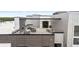 Inviting rooftop patio with comfortable seating and dining area, offering stunning views, perfect for outdoor living at 1898 S Bannock St # 202, Denver, CO 80223