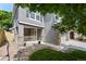 Inviting front porch with stone accents and a cozy space for relaxation and outdoor enjoyment at 4975 S Zephyr St, Littleton, CO 80123